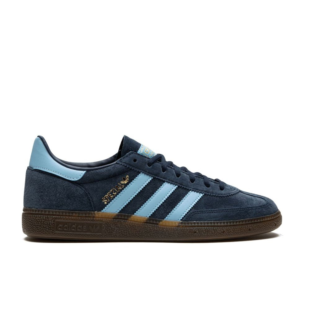 Side view of Adidas Originals Handball Spezial Navy (Women's) sneakers (style code: BD7633), showcasing its sleek design and navy colorway.