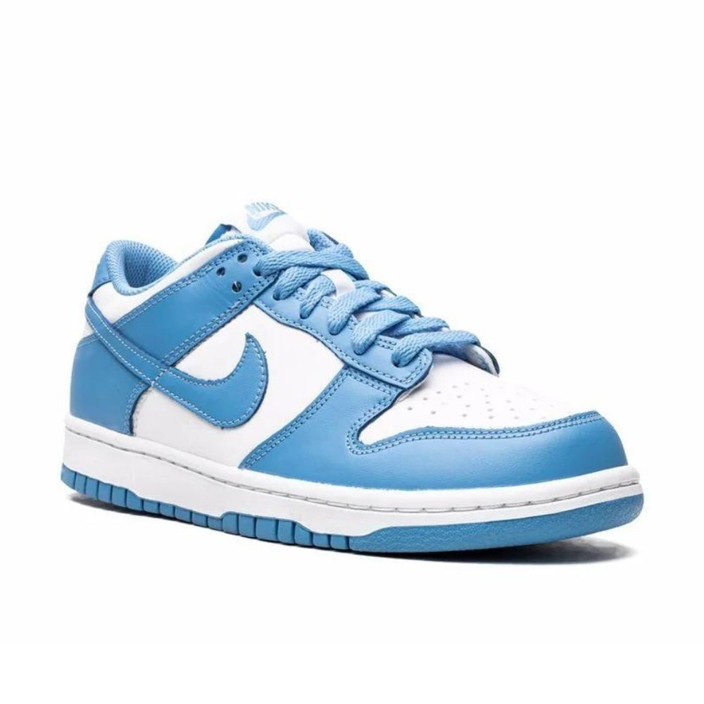 "Nike Dunk Low UNC ‘University Blue’ (GS) - Available at TRM Exclusives CW1590-103. Front view showcasing iconic 'University Blue' colorway. Get yours now!"